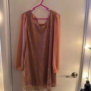 Coral/rust colored sequined and lace long sleeve dress with criss cross back